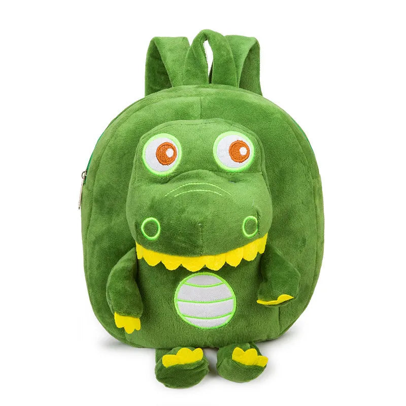 Blue baby dinosaur plush backpack with embroidered detail and a soft handle.