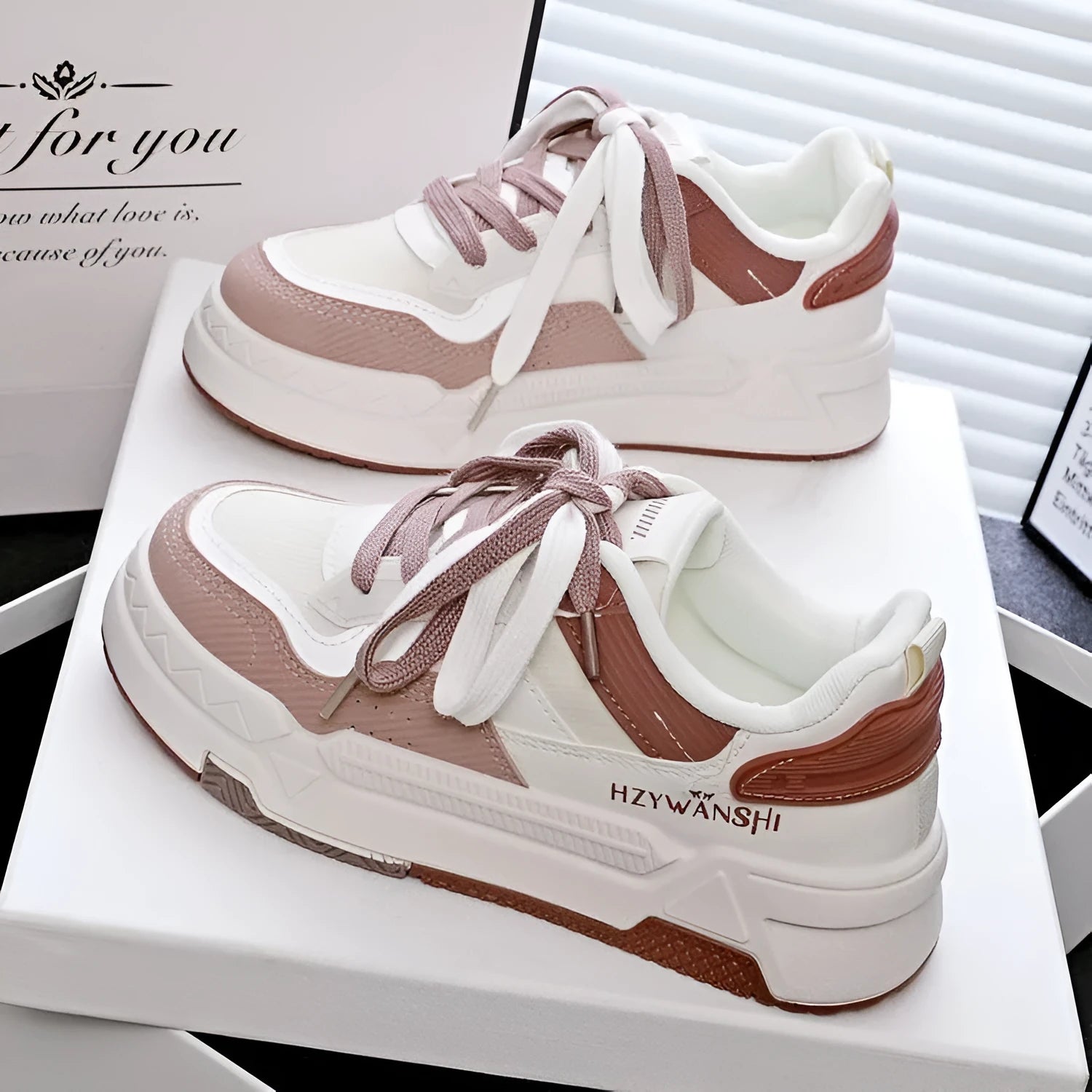 Children's beige board shoes with thick rubber sole, lace-up front, and cross shoulder straps