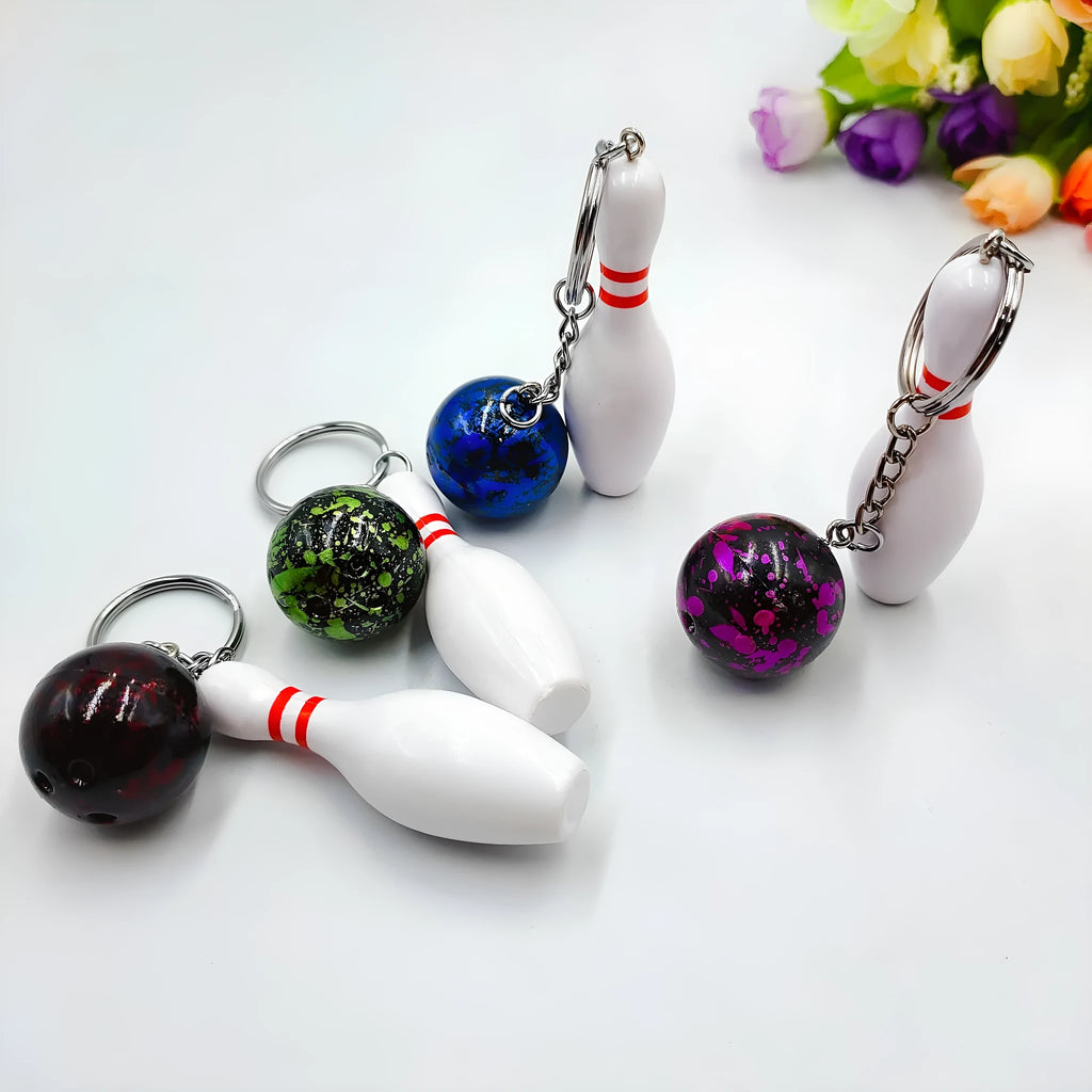 Mini bowling ball keychain pendant in blue colour with metal ring