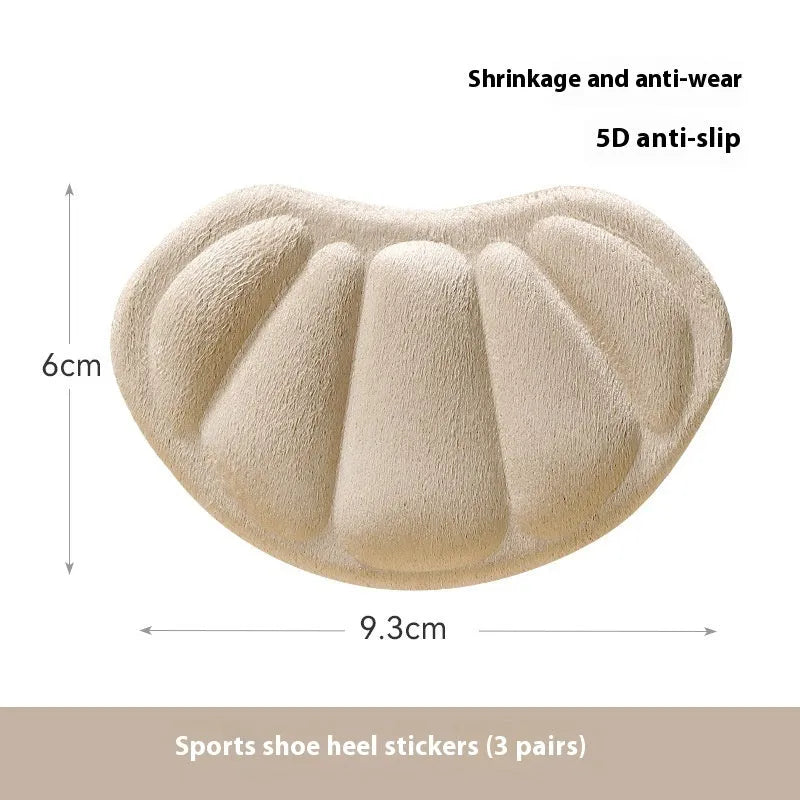 Three pairs of camel-coloured suede heel cushion pads with adhesive backing for shoes.