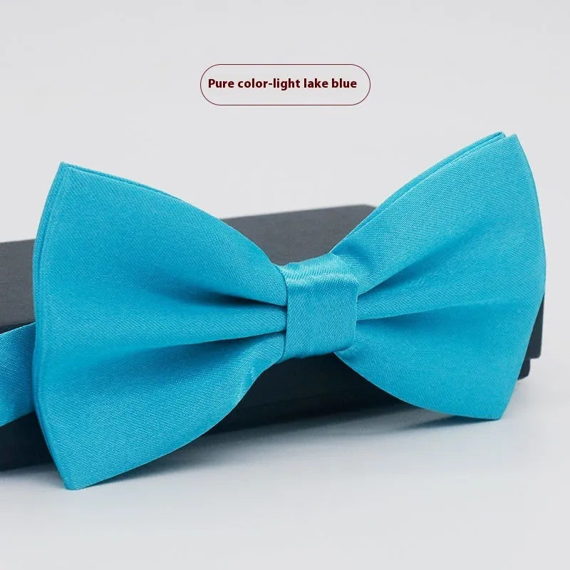 Men's flat head solid colour bow tie in polyester, showing 12cm by 6cm size on a background.
