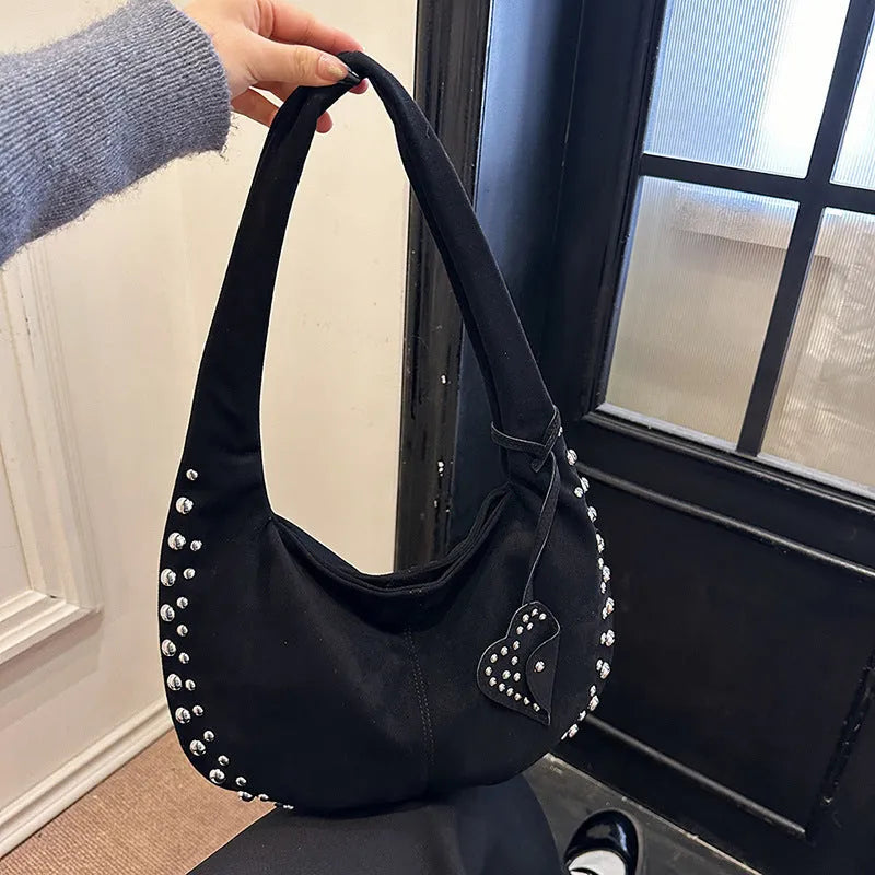 Soft plush women's tote handbag in retro style, carried underarm.