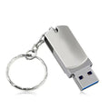 White metal rotary USB flash drive showing compact dimensions and rotating mechanism