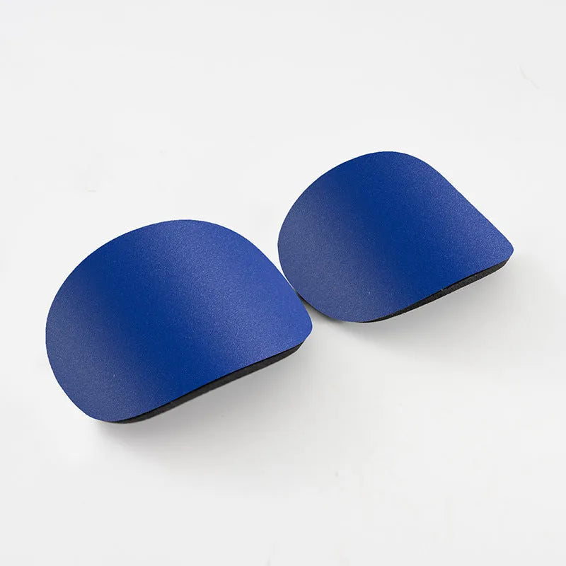 PU mini shin guards for football and sports in black, white, red, and blue colours.
