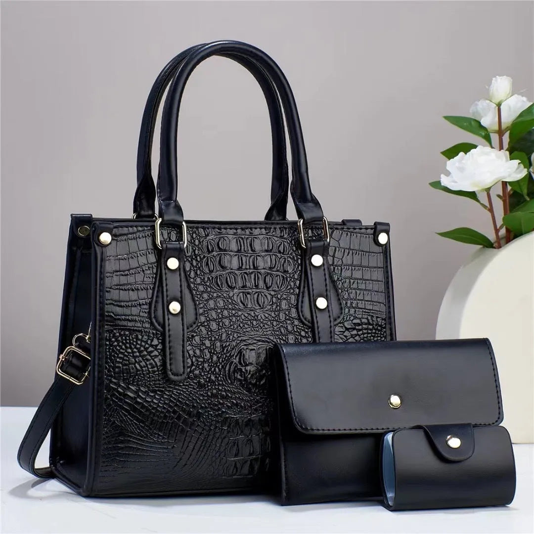 Three-piece PU bag set in chosen colour showing bucket crossbody bag, matching wallet, and card holder.