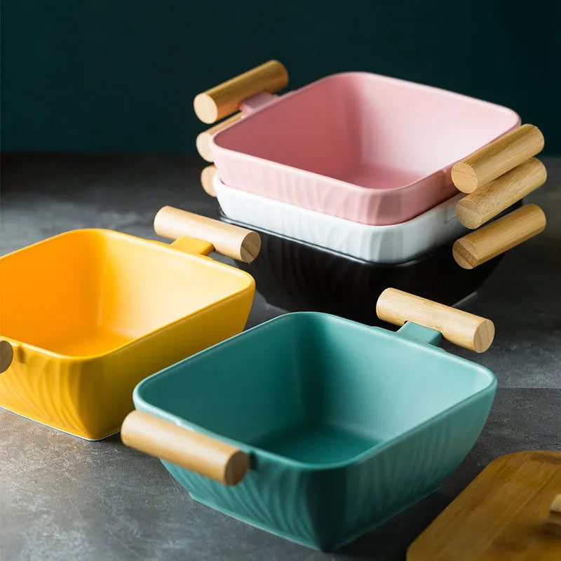 Porcelain ceramic bowl with irregular shape and matching lid in modern design