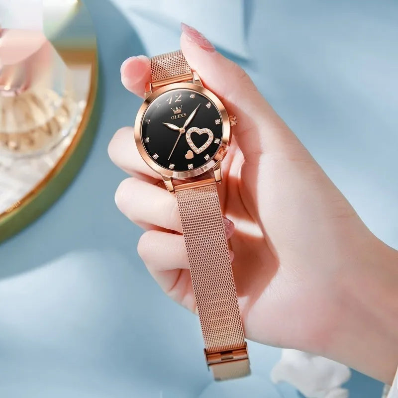 Women's fashion watch with mesh strap and Rose shell case showing six colour face options
