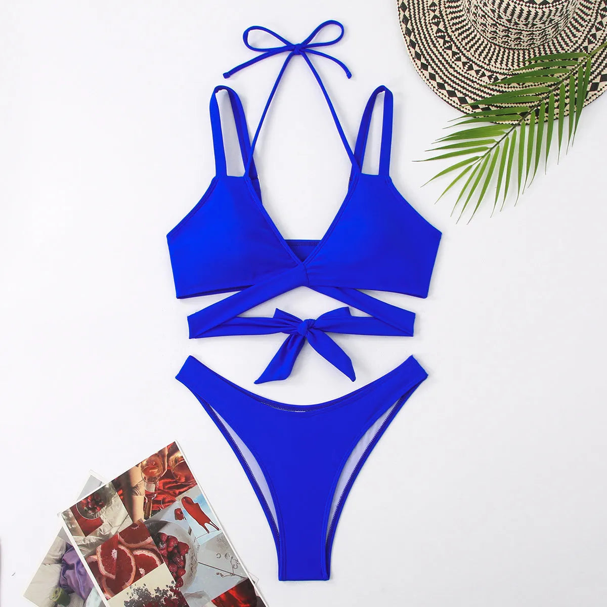 Women's solid colour strap beach bikini swimsuit in a briefs style, shown in one of five colour options.