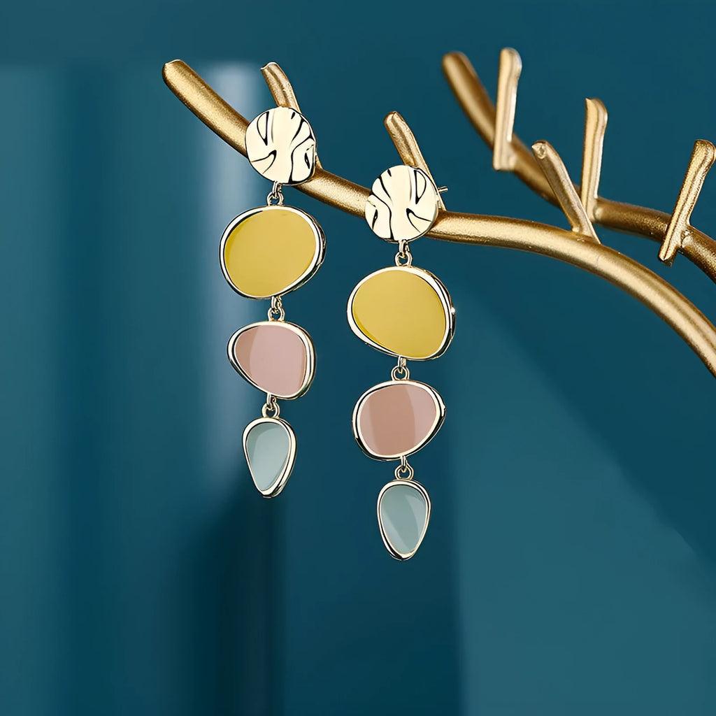Morandi three-colour oil drip finish on disc-shaped alloy earrings with sterling silver posts.