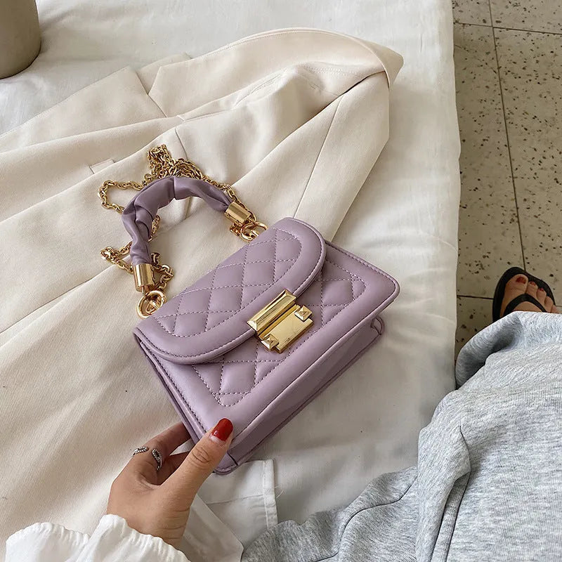 Korean-style rhombus shoulder bag in purple with crossbody strap and small square design