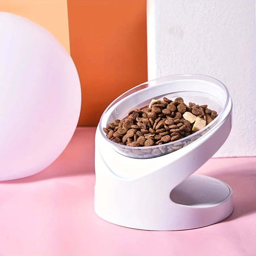 White elevated plastic cat food bowl with a slanted design for comfortable feeding.