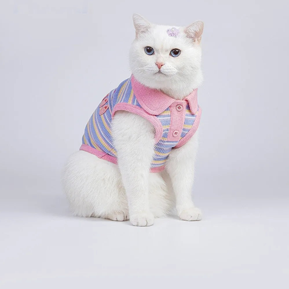 Pink purple sleeveless dog vest with a knitted turtleneck collar laid flat.