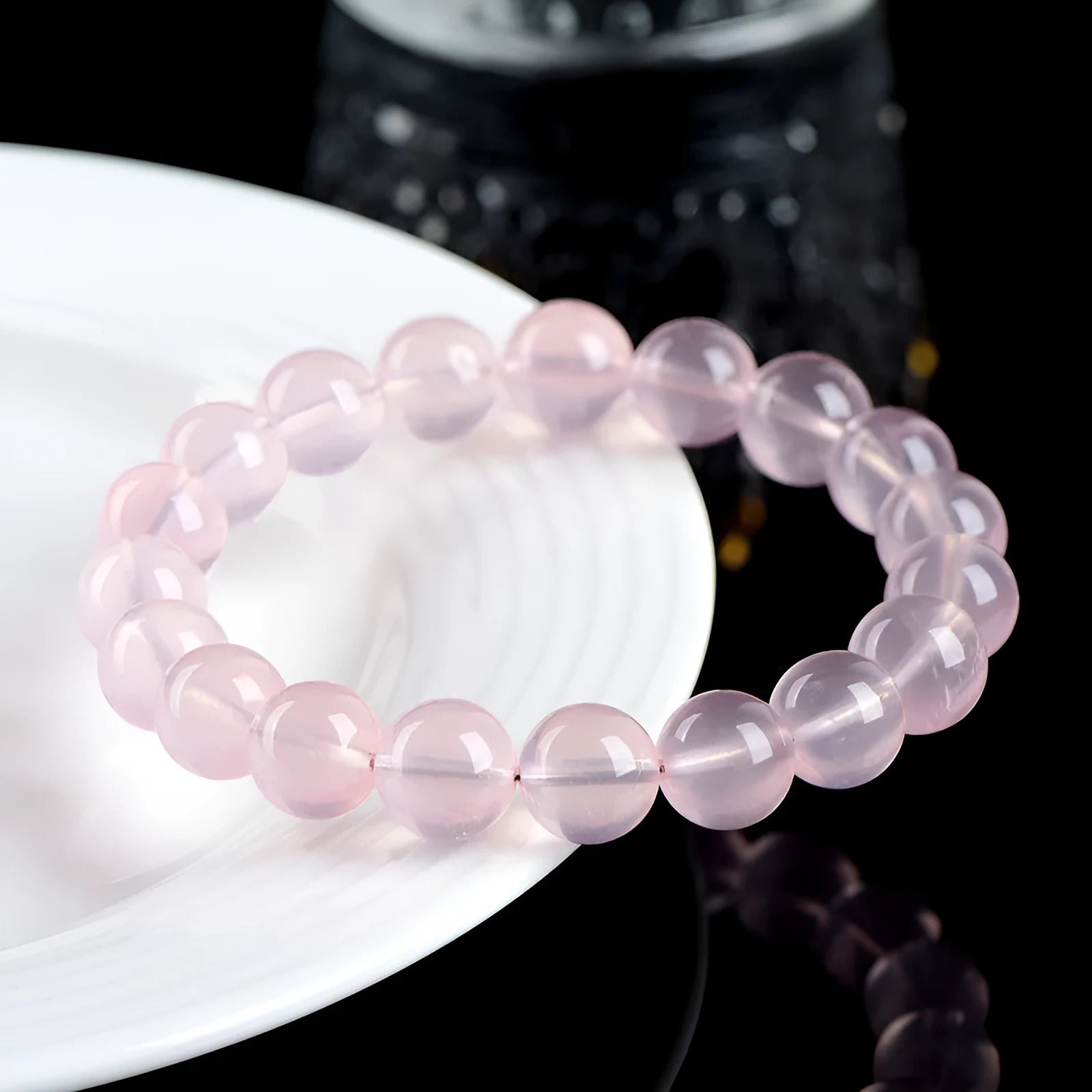 Women's natural starlight crystal bracelet with round pink beads in various size options