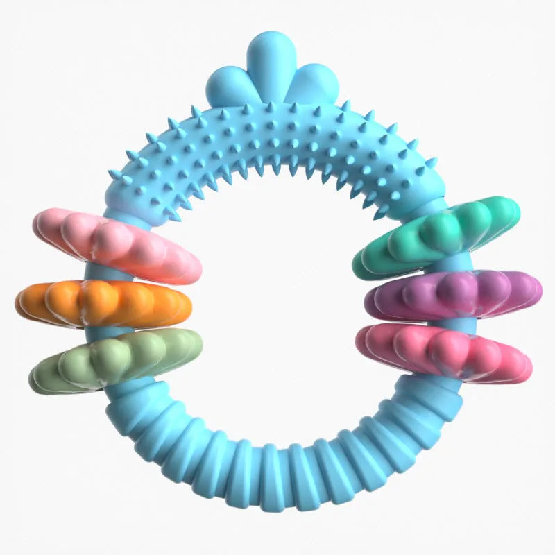 Blue green pink TPR rubber molar stick dog chew toy for small dogs on a white background