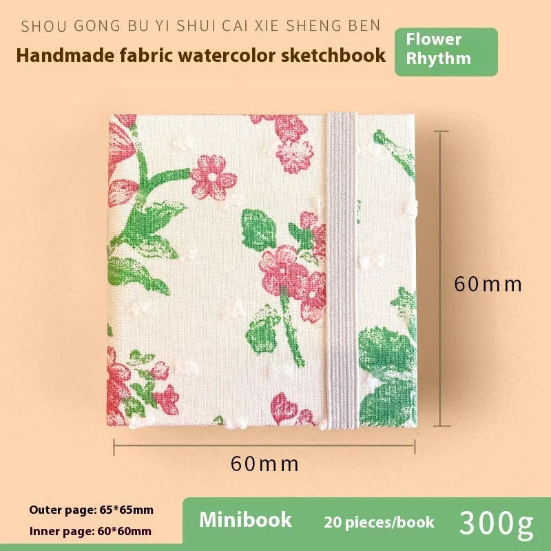Feiluniao handmade fabric watercolour sketchbook with colourful themed cover, 185mm long.