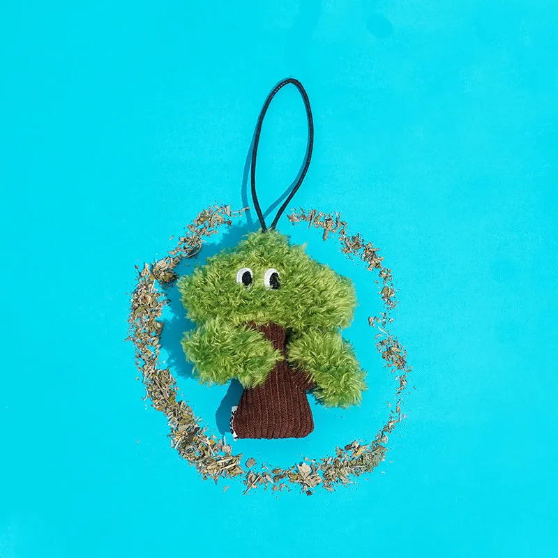 Pine tree shaped cat toy stick with an attached mint-scented bag pendant on a string.