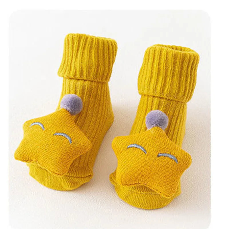 Cotton baby floor socks in various patterns including animal prints, stars, and bows for infants aged 0-3 months
