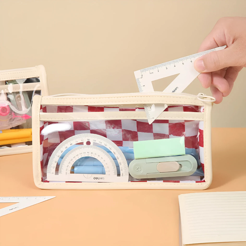 Large transparent PVC pencil case with a chessboard pattern, showing pens inside.
