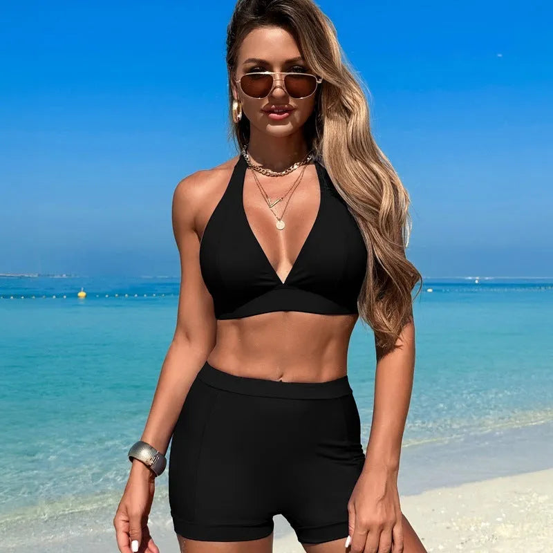 Women's split style bikini swimsuit set for swimming in black colour