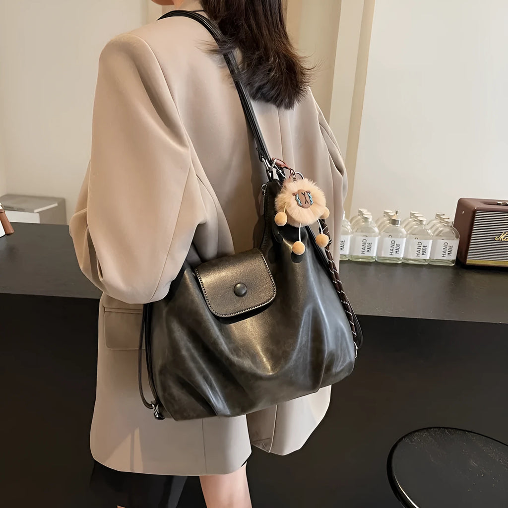 Women's black PU leather horizontal square shoulder bag with single strap and internal phone pocket