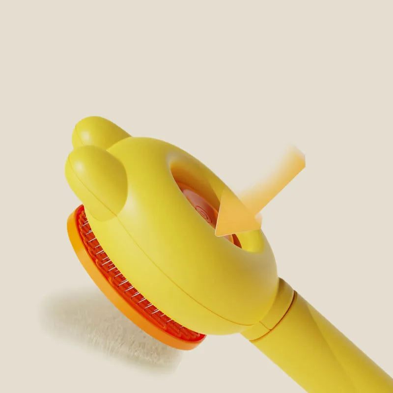 Self-cleaning pet grooming brush with release button in green, pink, purple or yellow colours