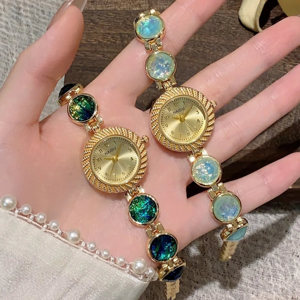 Women's 25mm round quartz watch in zinc alloy case showing six colour options