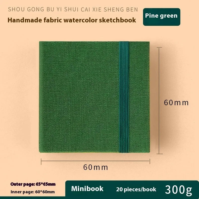 Feiluniao handmade fabric watercolour sketchbook with colourful themed cover, 185mm long.