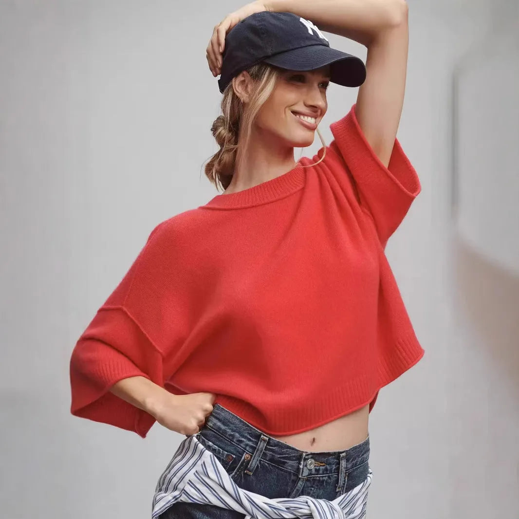 Red short viscose T-shirt with exposed navel styling on a mannequin.