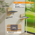 A space capsule style cat scratching post made of sisal with hanging rope lanyards.