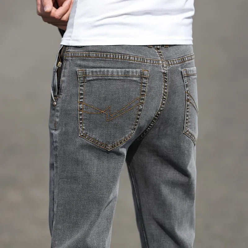 Men's smoky gray low-waist straight-leg jeans made from elastic rabbit fur fabric with a zip fly.