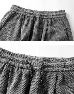 Hollow-out straight-leg trousers with fleece lining in light grey, shown on a hanger