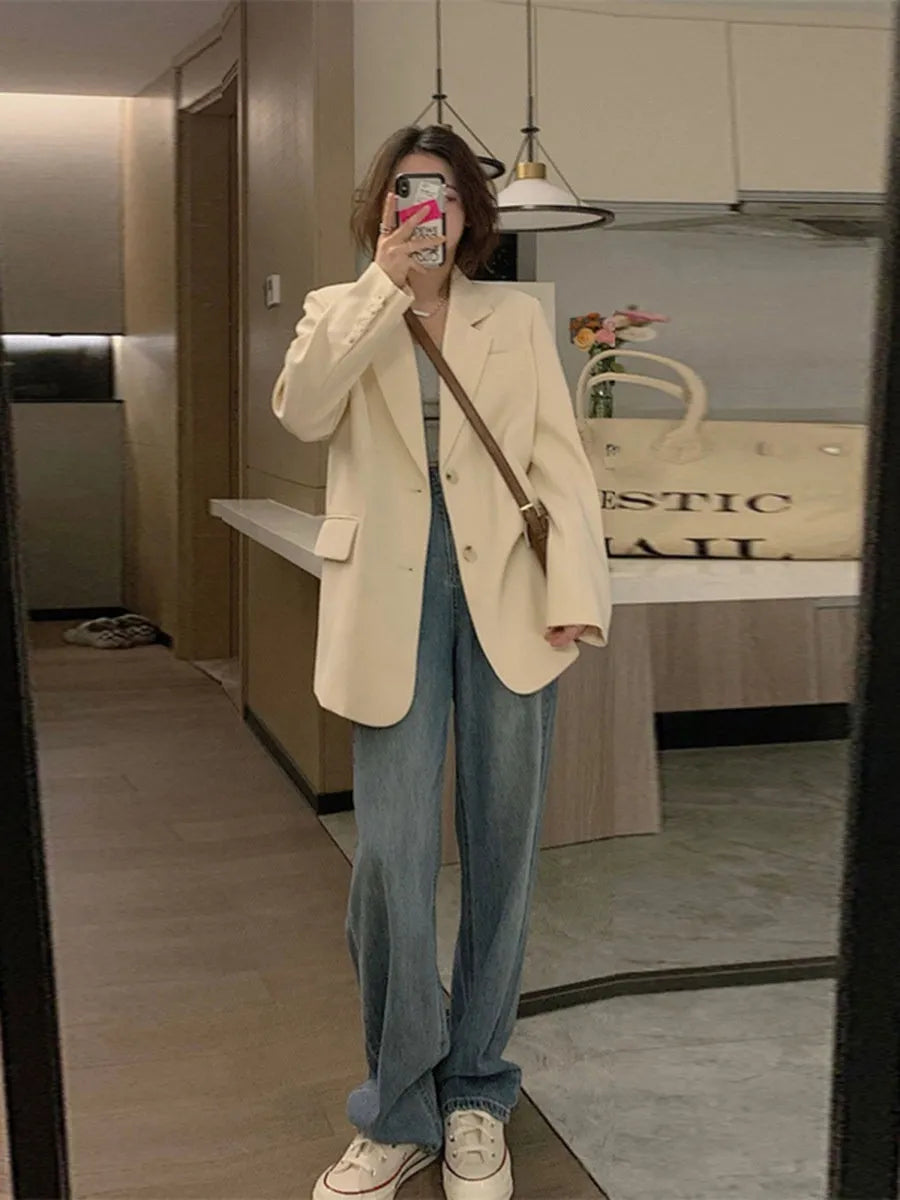 Men's solid colour Korean-style street blazer jacket on a hanger