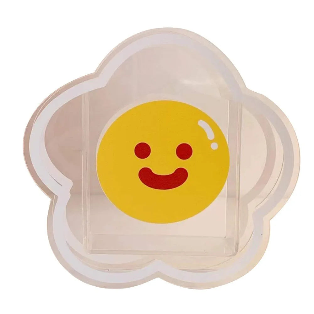 Clear square acrylic storage box with a cute decorative pattern, for stationery on a desk.
