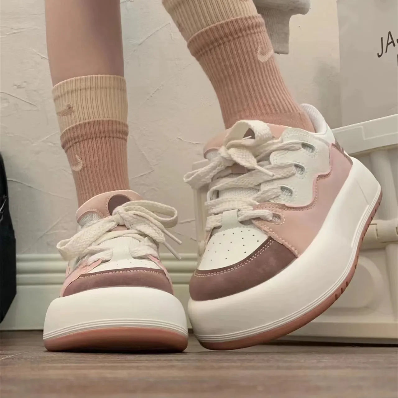 Green women's flat casual sneakers with a round toe and breathable PU mesh upper.