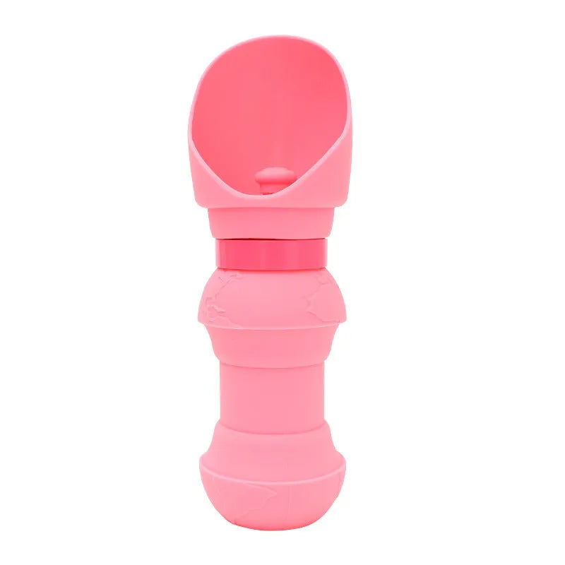 A folded and unfolded silicone water cup for pets, shown in green pineapple colour.