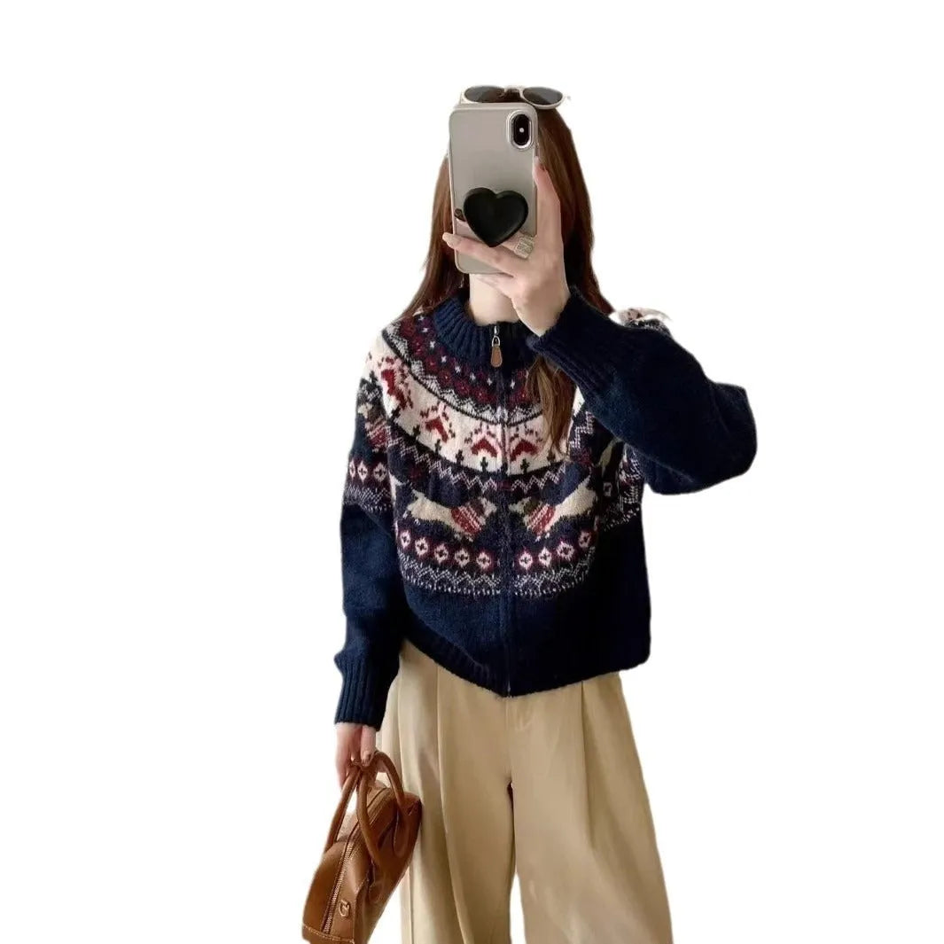 Women's ethnic jacquard pullover sweater with 3D pattern in beige apricot, showing loose fit and long sleeves.