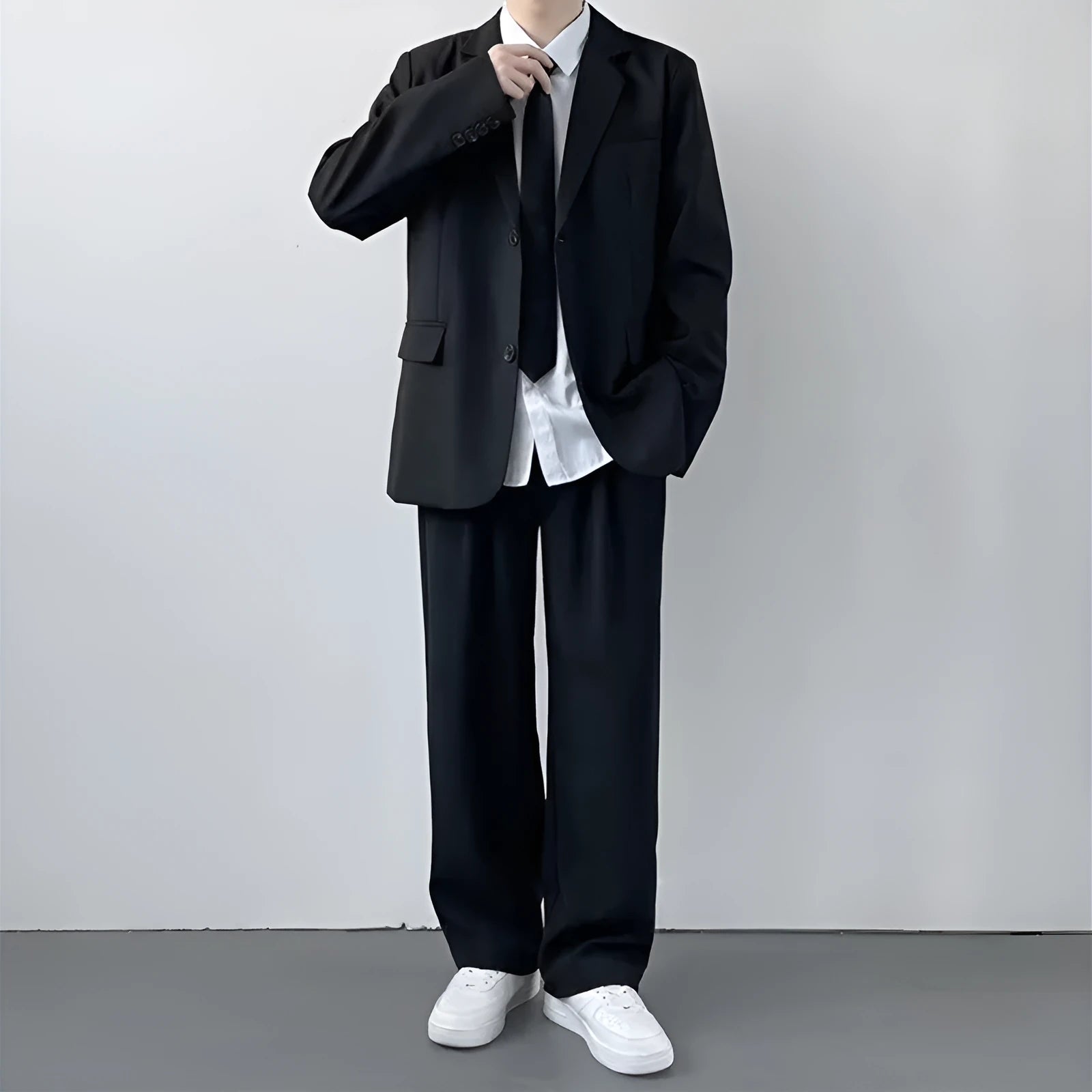Plus size men's college style suit set with trousers, white shirt, and tie included
