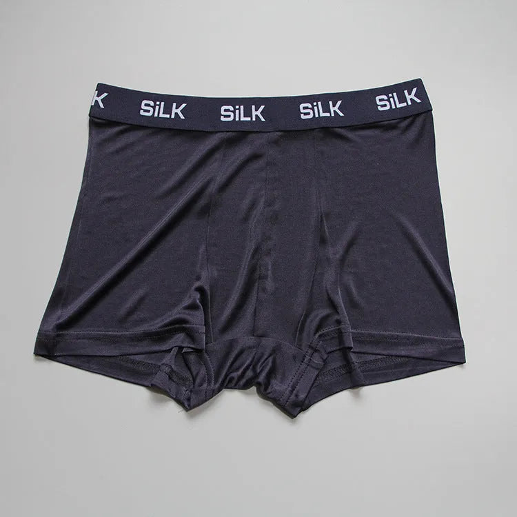 Men's silk shorts in loose fit with mid waist, available in navy blue, silver grey or skin colour