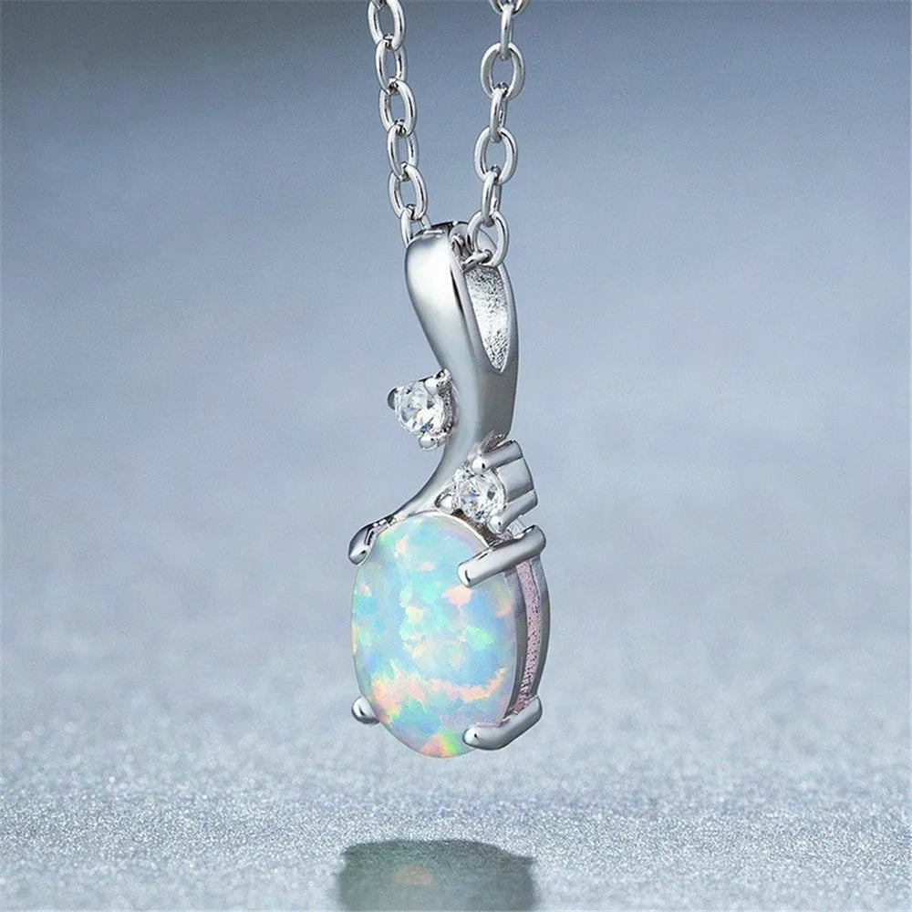 Water drop shaped opal pendant necklace on adjustable O chain in rose gold or white