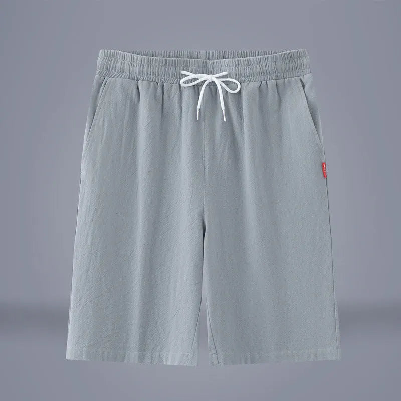 Cotton and linen cropped trousers with drawstring waist in solid colour on hanger