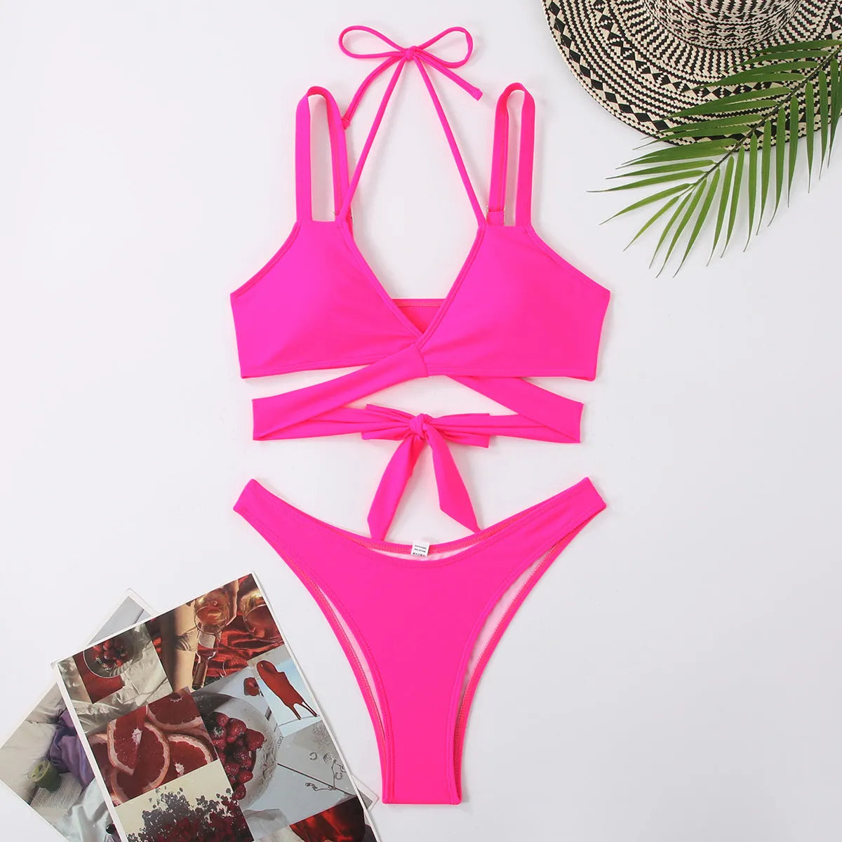 Women's solid colour strap beach bikini swimsuit in a briefs style, shown in one of five colour options.