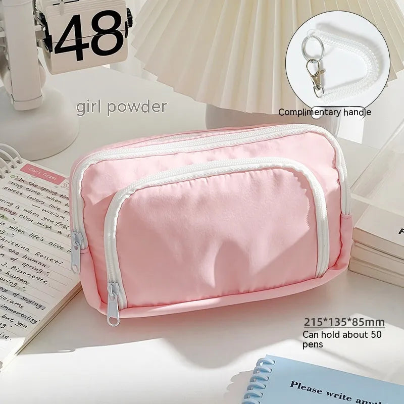 Double layer pencil case in blue, pink, cream, or green with gift handle, dimensions 215x135x85mm