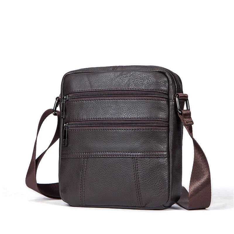 Men's black genuine leather vintage shoulder bag with a soft handle, shown closed.