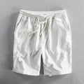 Men's striped cotton casual shorts showing straight-leg design and mid-waist fit