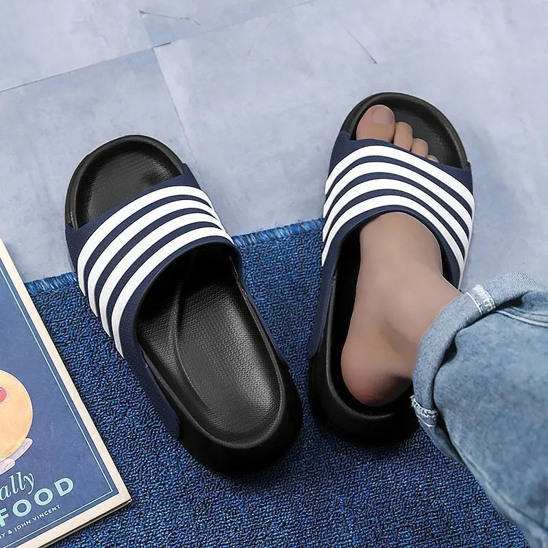 Casual unisex slip-on slippers with PVC upper and EVA sole for outdoor leisure wear.