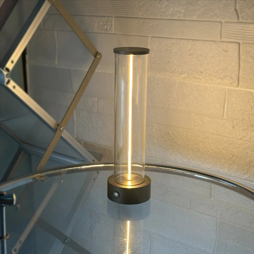 Slender modern LED glass light strip with magnetic back for USB-powered ambient lighting.