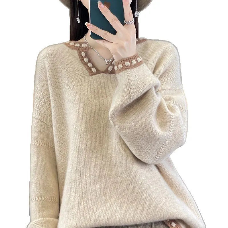 Women's white V-neck viscose sweater with long sleeves on hanger