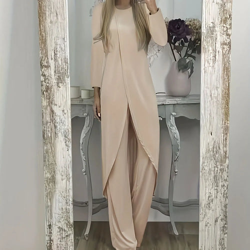Casual loose-fitting long sleeve top and trousers lounge set in polyester.