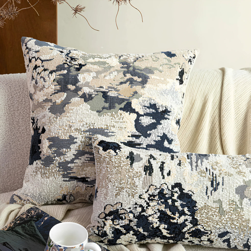 Antique blue floral patterned cushion in wool blend material showing French style design with feather velvet filler