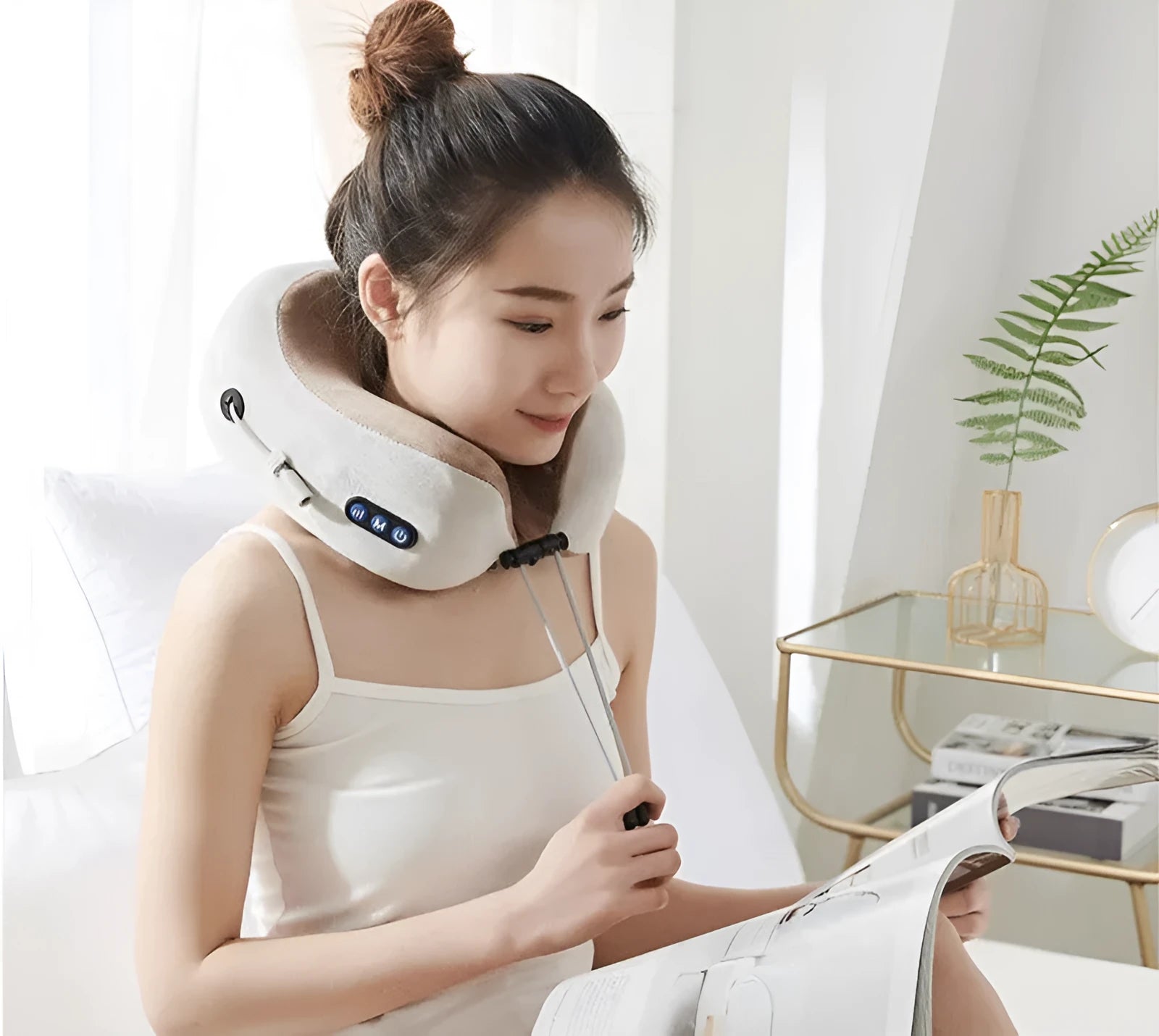 Brown U-shaped electric neck massage pillow with USB charging port and control buttons